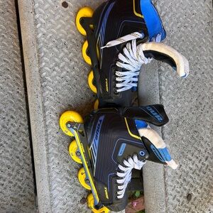 Blue and Black Inline Skates with Yellow Wheels
